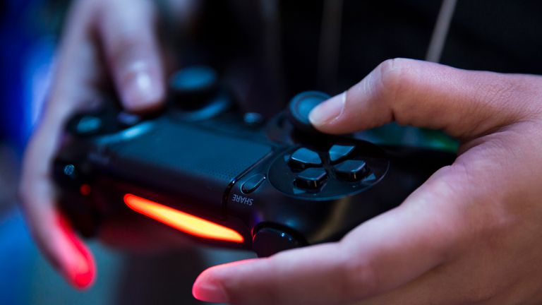 CHIBA, JAPAN - SEPTEMBER 20: An attendee plays a video game on the PlayStation 4 video game console in the Sony Interactive Entertainment booth during the Tokyo Game Show 2018 on September 20, 2018 in Chiba, Japan. The Tokyo Game Show is held from September 20 to 23, 2018. (Photo by Tomohiro Ohsumi/Getty Images) 