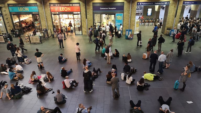 People waiting inside King’s Cross station, London, as all services in and out of the station have been suspended, after a large power cut has caused “apocalyptic” rush-hour scenes across England and Wales, with traffic lights down and trains coming to a standstill. PRESS ASSOCIATION Photo. Picture date: Friday August 9, 2019. Nearly a million customers faced blackouts late on Friday afternoon after what the National Grid Electricity System Operator said were issues with two generators, which we