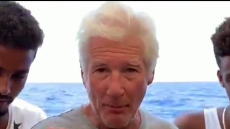 Richard Gere joins migrants on a boat in the Mediterranean