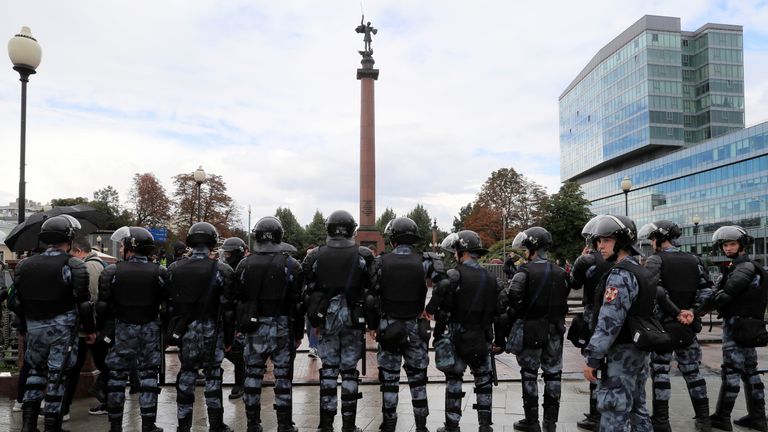 Police stand guard during opposition rally in Moscow 