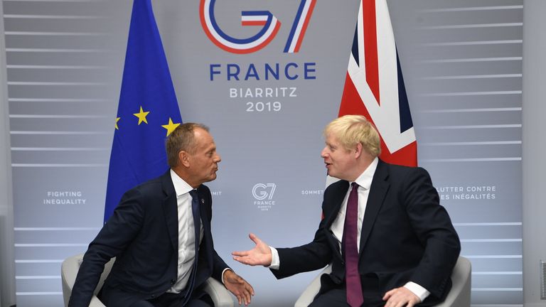 Biarritz, France. Boris Johnson attends the G7- Day Two. Britain&#39;s Prime Minister Boris Johnson meets with President of the European Council Donald Tusk at the G7 Summit in Biarritz, France