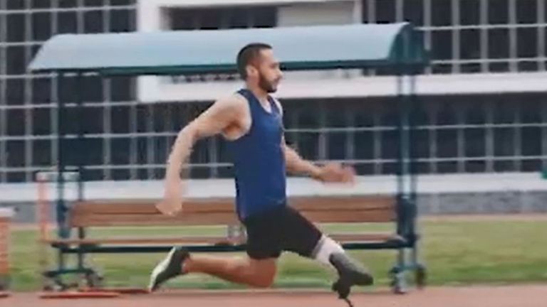 A male para-athlete with a prosthetic leg doing the long jump in the Volkswagen ad