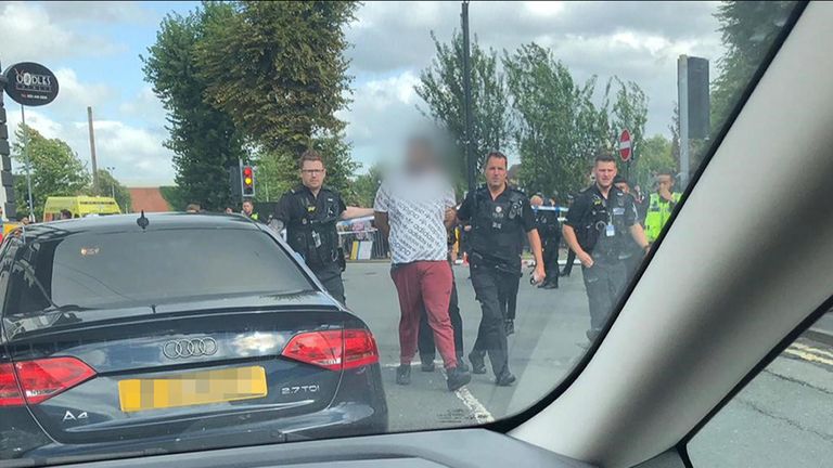 The man has been charged but won't give his details