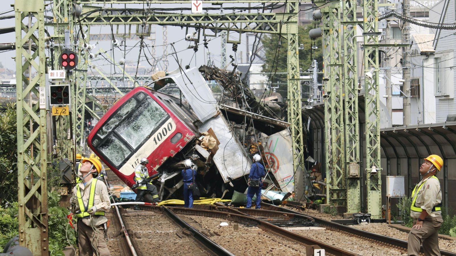 Japan train crash One dead, dozens injured after collision with truck