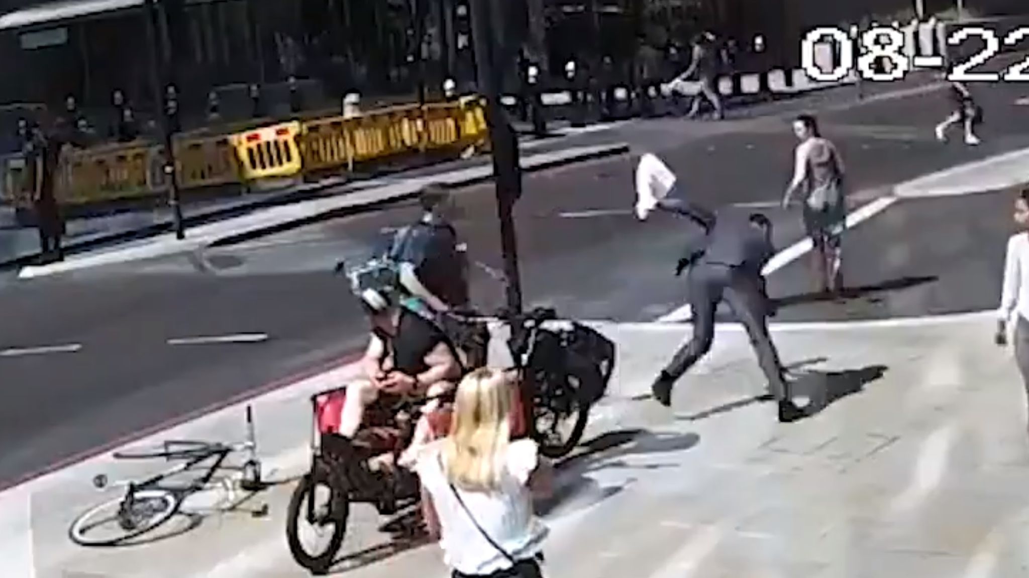 Man headbutted to the ground by cyclist who ran red light in London
