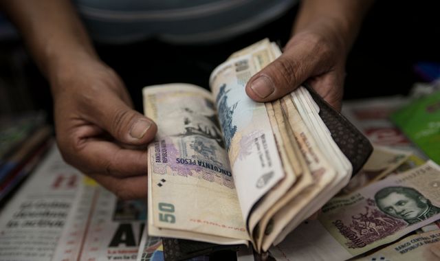 Argentina imposes currency controls amid debt crisis