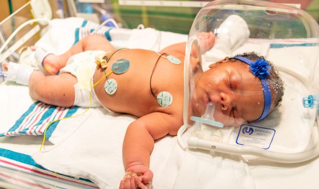 'Piece of joy': Baby born on 9/11 at 9.11pm and weighing 9lbs 11oz