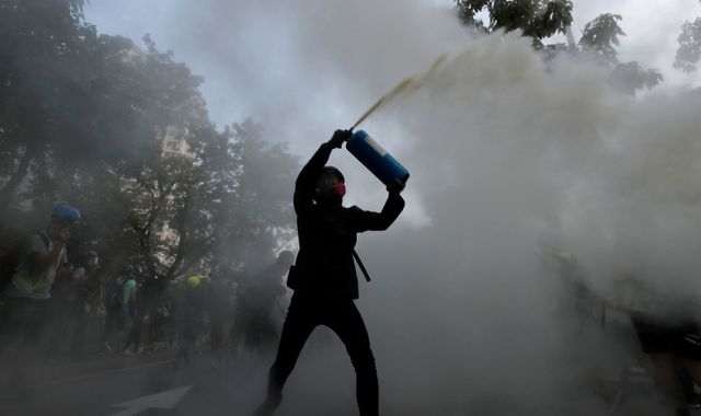 Hong Kong: Chinese flag burned as protests enter their 16th week