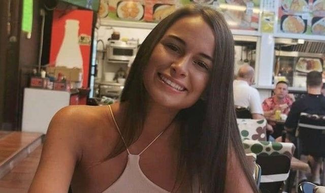 Teenager charged with murder after woman's body found in woods