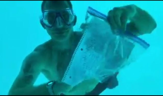 Man who proposed to girlfriend underwater 'never emerged'