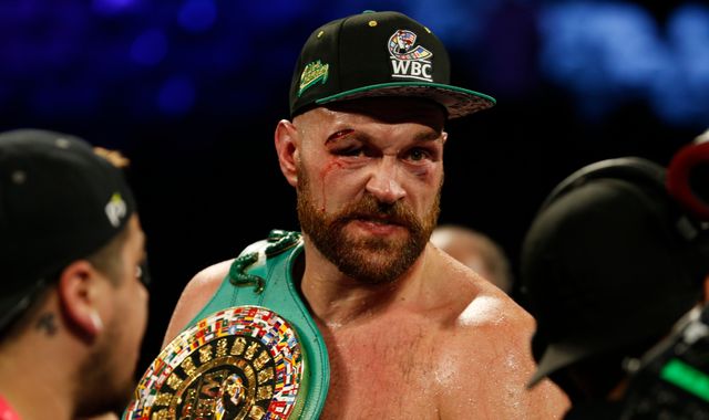 Tyson Fury overcomes bloodied eye to beat Otto Wallin on points
