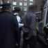 Police smash down doors as they raid homes of violent drug gangs