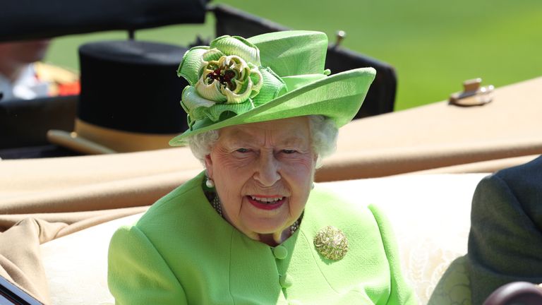 Queen Elizabeth II in her carriage during day one of Royal Ascot at Ascot Racecourse.