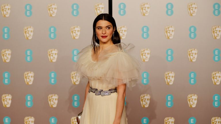 British actress Rachel Weisz poses on the red carpet upon arrival at the BAFTA British Academy Film Awards at the Royal Albert Hall in London on February 10, 2019. (Photo by Tolga AKMEN / AFP)        (Photo credit should read TOLGA AKMEN/AFP/Getty Images)