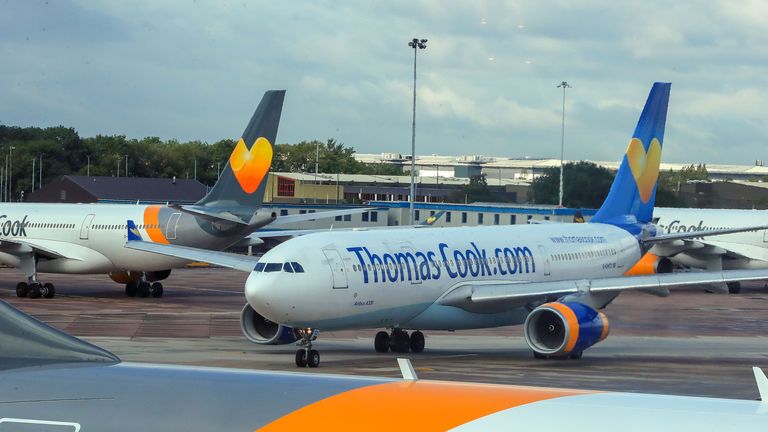 Thomas Cook planes on the runway at terminal one Manchester Airport.