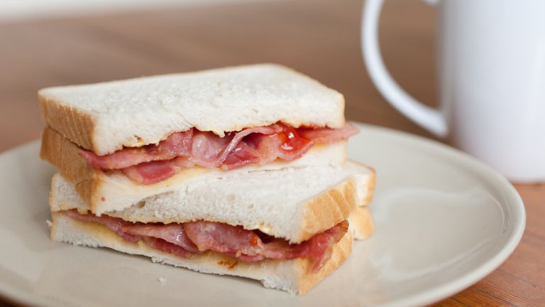 Bacon Butty (Sandwich) with ketchup - with a hot beverage alongside