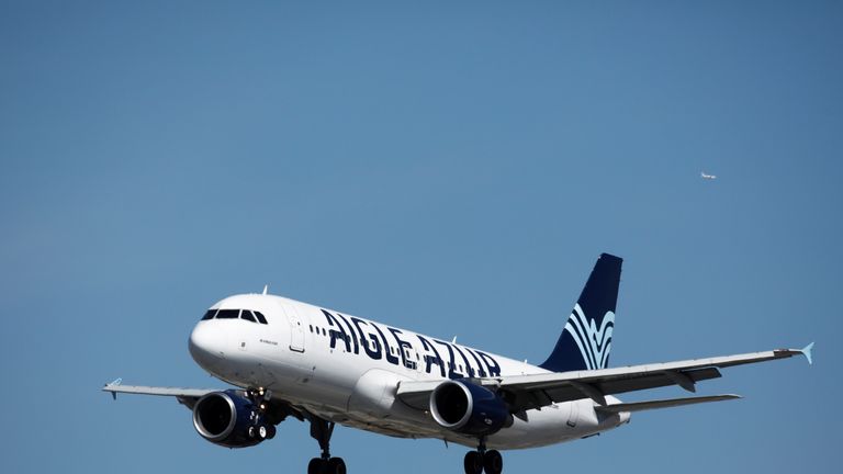 An Airbus A320-200 aircraft, operated by Aigle Azur, lands at Orly Airport near Paris, France, September 6, 2019. REUTERS/Benoit Tessier