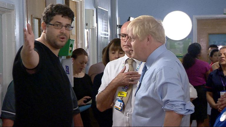 The prime minister&#39;s visit to a hospital was interrupted by a man angry over "years and years and years of the NHS being destroyed"