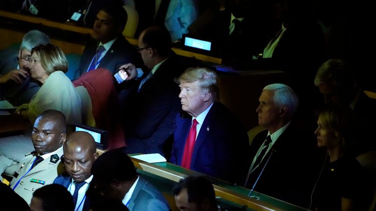 Donald Trump at the climate action summit, despite being a climate change sceptic 