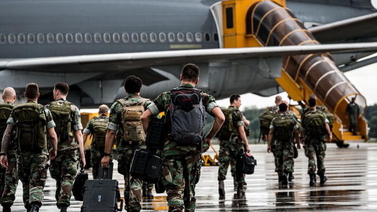 Dutch soldiers arrive at the Eindhoven Air Base to board a plane to the Caribbean to provide emergency relief to those affected by Hurricane Dorian in the Bahamas, on September 7, 2019, in Eindhoven