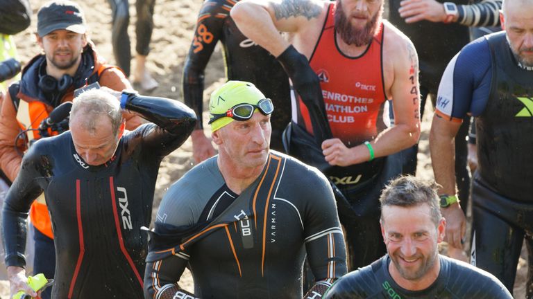 Tearful Gareth Thomas hugs husband during Ironman hours after revealing ...