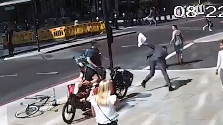 The cyclist headbutted the man, leaving him with a facial wound and arm injury