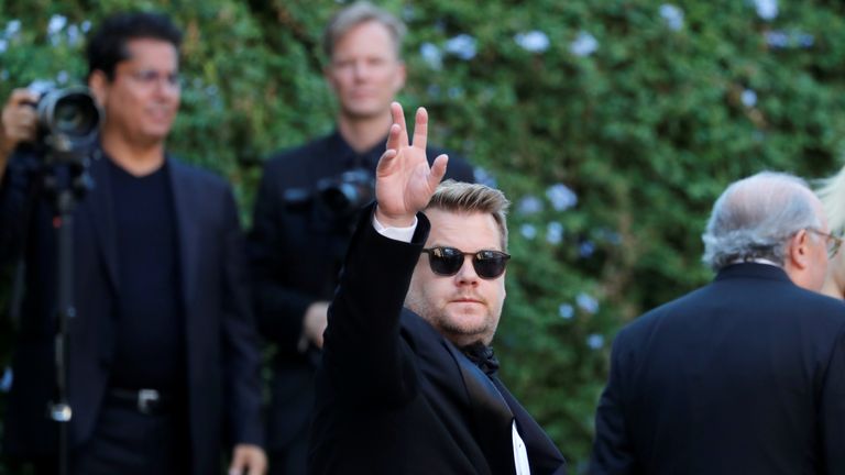 James Corden gestures as he attends the wedding 