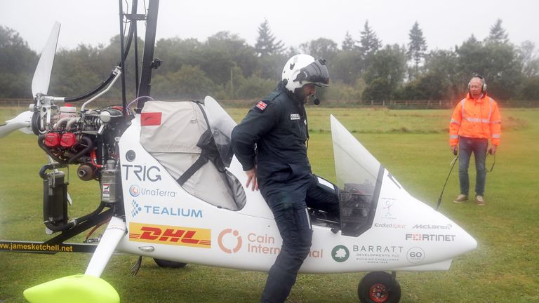 Mr Ketchell steps out of his gyrocopter in Hampshire