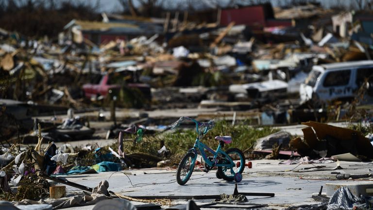 Belongings litter the ground in Marsh Harbour, Great Abaco, on September 7, 2019