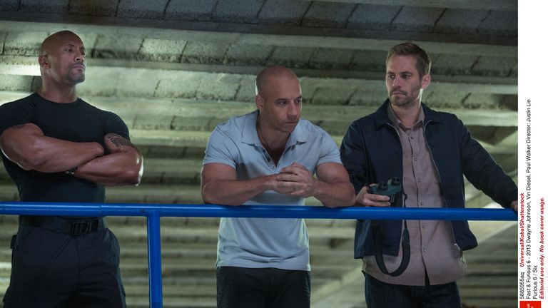Paul Walker with Dwayne Johnson and Vin Diesel in Fast and Furious 6