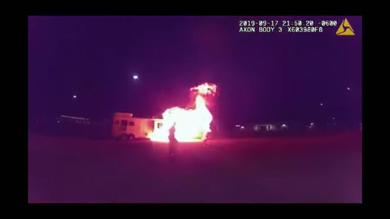 Body camera shows the moment of the blast then officers help two, a 63-year-old man and 59-year-old woman, to safety