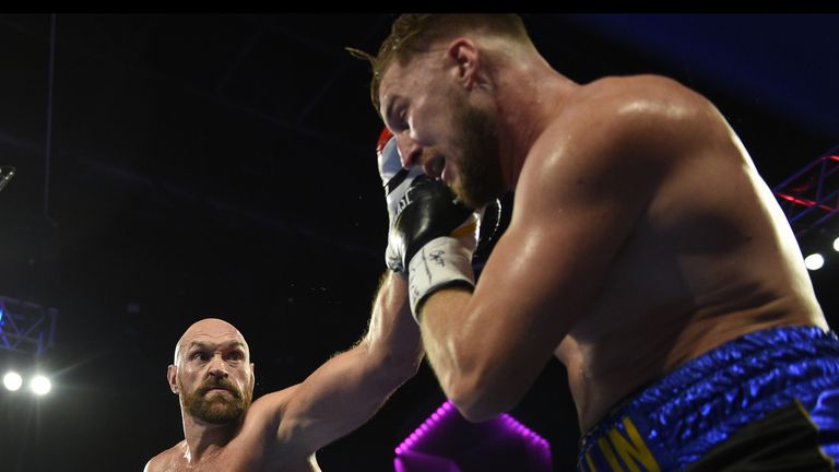 Tyson Fury punches Otto Wallin during their heavyweight fight at T-Mobile Arena