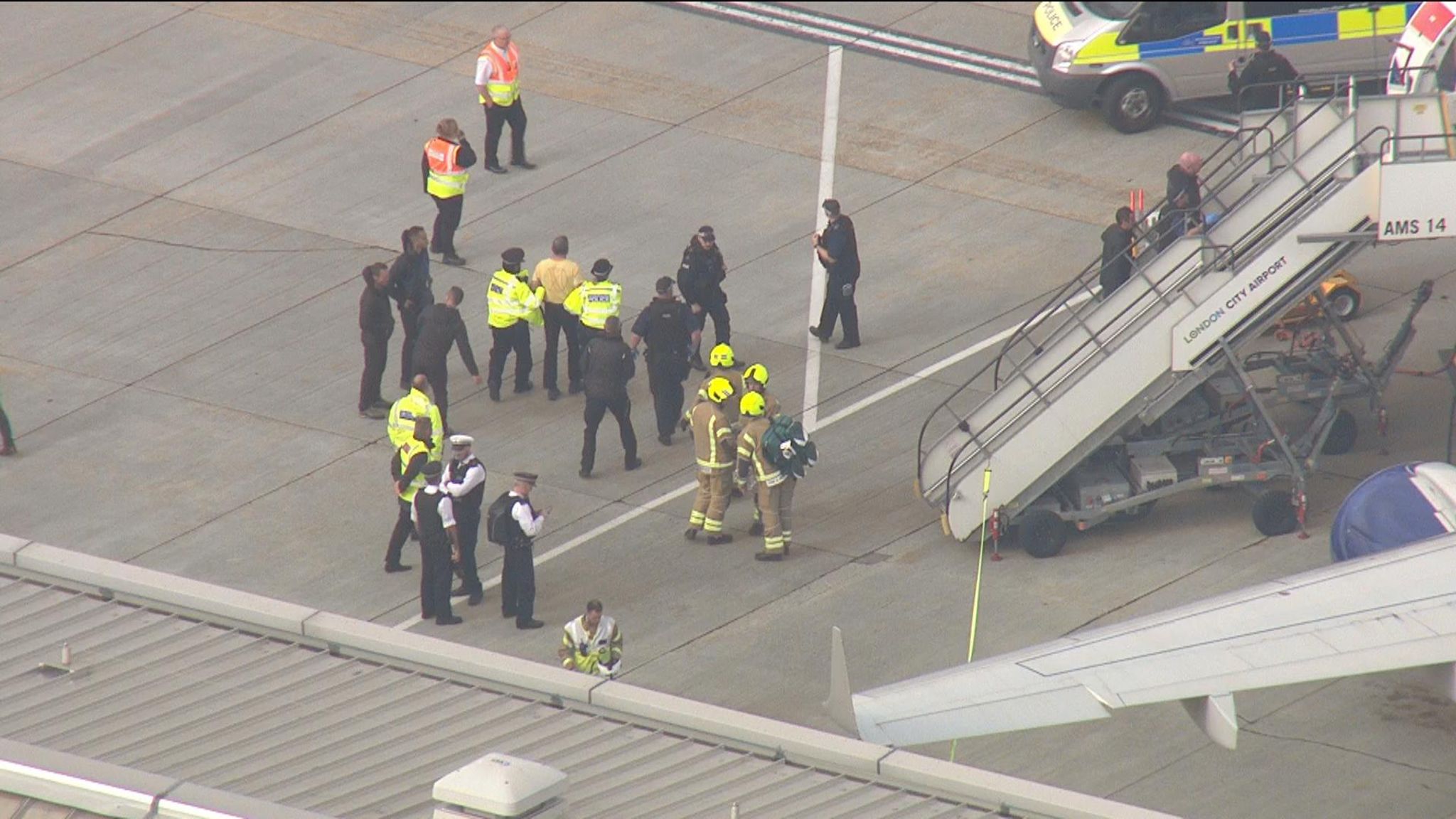 Extinction Rebellion Protester Climbs On Plane At London City Airport ...