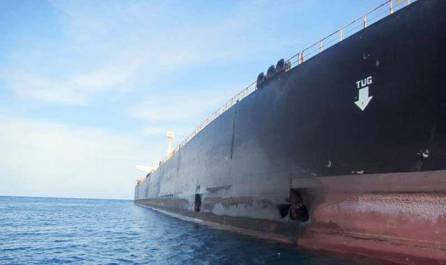 Iran reveals pictures of oil tanker 'damaged by rocket strike'