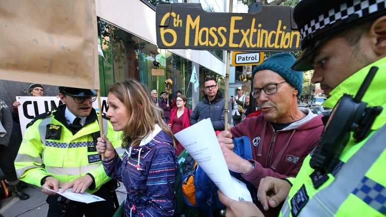 Police outside of the Department for Environment, Food and Rural Affairs, Marsham Street, during an Extinction Rebellion (XR) protest in Westminster, London.