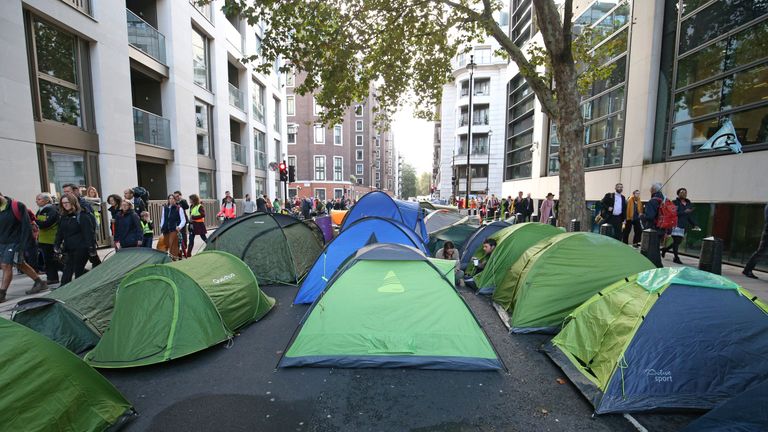 Extinction Rebellion (XR) protesters who have set up camp on Horseferry Road and Marsham Street in Westminster, London.