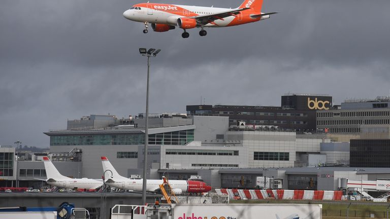 An EasyJet plane on its final approach before landing at Gatwick airport, which has been closed after drones were spotted over the airfield Wednesday night and throughout Thursday.