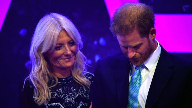 The Duke of Sussex reacts next to television presenter Gaby Roslin as he delivers a speech during the annual WellChild Awards at the Royal Lancaster Hotel, London.