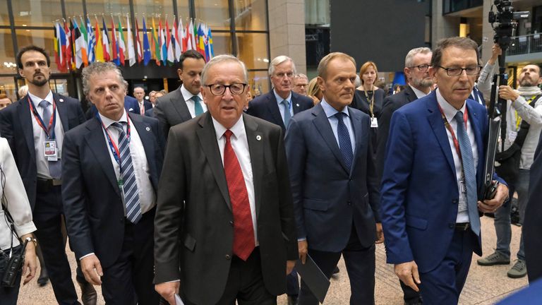 BRUSSELS, BELGIUM - OCTOBER 17: European Commission President Jean-Claude Juncker (C-L) and European Council President Donald Tusk (C-R) arrive to give statements to the media following the agreement by EU member state leaders of the Brexit deal at the summit of European Union leaders on October 17, 2019 in Brussels, Belgium. Officials announced earlier in the day that EU and UK negotiators have reached an agreement on the United Kingdoms departure from the EU. (Photo by Sean Gallup/Getty Images)