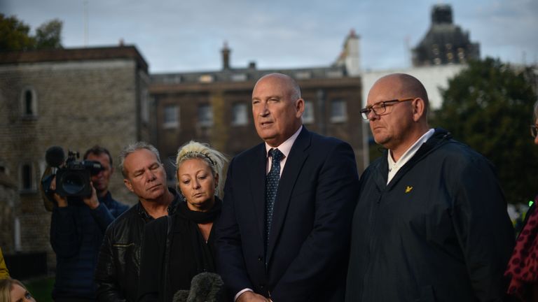 LONDON, ENGLAND - OCTOBER 09: Family spokesman Radd Seiger speaks on behalf of father of Harry Dunn, Tim Dunn (R) and mother Charlotte Charles (L) after meeting with Foreign Secretary Dominic Raab on October 9, 2019 in London, England. Motorcyclist Harry Dunn, 19, died in a collision with a car in Northamptonshire on August 27th. Anne Sacoolas, the wife of a US diplomat, was named as a suspect in the crash but later left the UK despite telling police she had no such plans. (Photo by Peter Summers/Getty Images)