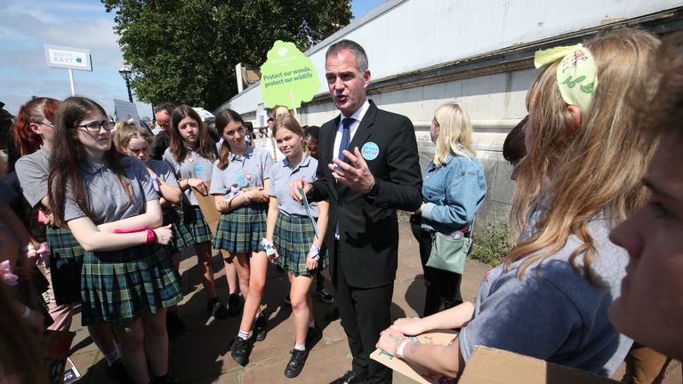 Peter Kyle MP speaks to people on the Albert Embankment, as climate activists make their way to join the lobby of Parliament on taking action on climate change and environmental protection in Parliament Square, Westminster, London.