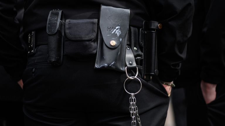 BEDFORD, ENGLAND - SEPTEMBER 14: A utility belt and keychain is seen on a man as prison staff gather outside HM Prison Bedford during an unofficial protest on September 14, 2018 in Bedford, England. The Prison Officers Association called for staff to stage an immediate walk-out this morning demanding the government improve safety in jails and reduce overcrowding and violence among inmates. (Photo by Leon Neal/Getty Images)