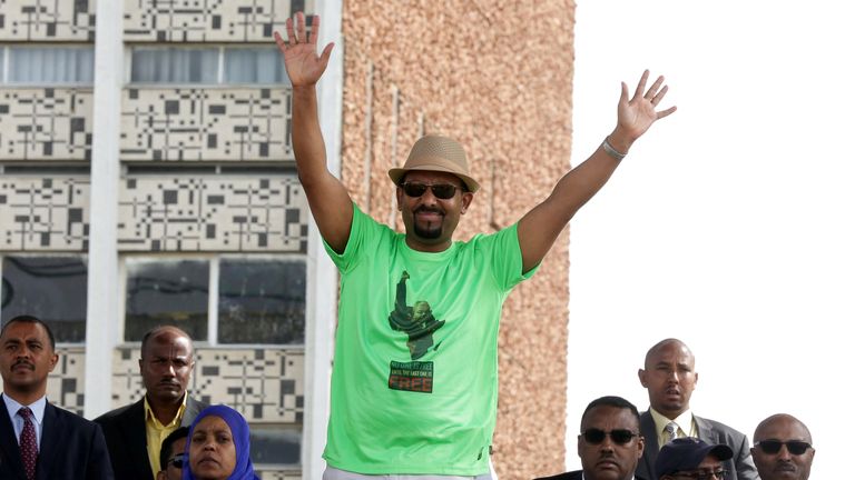 Ethiopian Prime Minister Abiy Ahmed waves to supporters 