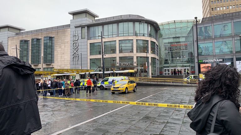 Police vehicles outside the Arndale Centre in Manchester