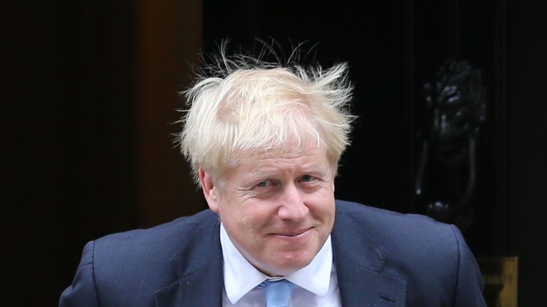 Boris Johnson comes out of 10 Downing Street to greet NATO secretary general Jens Stoltenberg