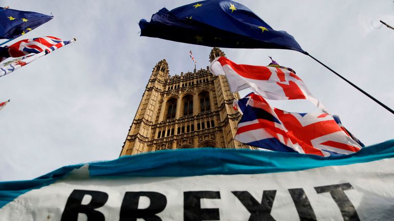 TOPSHOT - A pro-Brexit banner is seen outside the Houses of Parliament in London on October 30. 2019. - Britain&#39;s political leaders tested their election pitches today after parliament backed Prime Minister Boris Johnson&#39;s bid for a pre-Christmas poll aimed at breaking the years-long Brexit impasse. (Photo by Tolga AKMEN / AFP) (Photo by TOLGA AKMEN/AFP via Getty Images)
