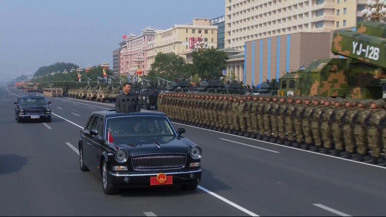 The president rode on an open-top limousine through the streets
