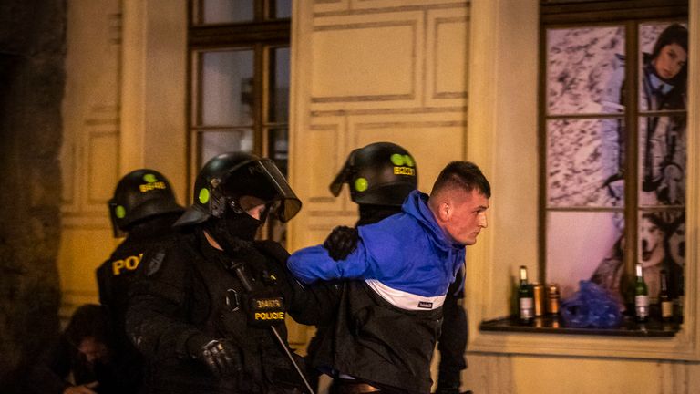 PRAGUE, CZECH REPUBLIC - OCTOBER 11: England fans detained by police in Prague ahead of the European Championship qualifying match between Czech Republic and England on October 11, 2019 in Prague, Czech Republic. (Photo by Gabriel Kuchta/Getty Images) 