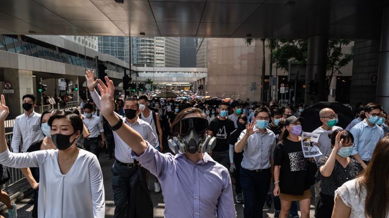 Protests over the mask ban are growing in the centre of the city