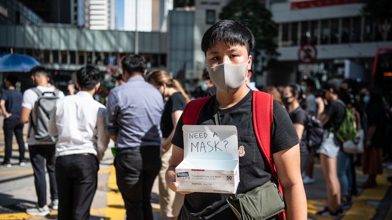 A protesters flouts the Hong Kong governmet's ban on masks in public